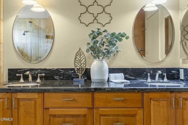 full bath with a sink and double vanity