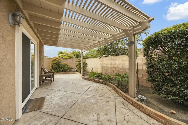 view of patio featuring a fenced backyard and a pergola