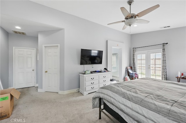 carpeted bedroom with access to exterior, french doors, visible vents, and baseboards