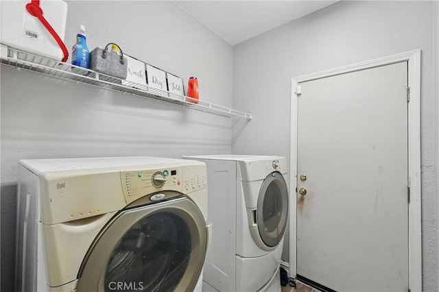 washroom with washer and dryer and laundry area