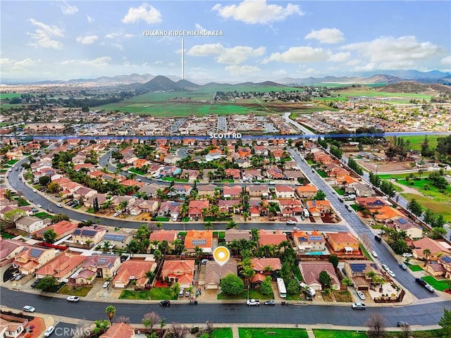 aerial view with a mountain view and a residential view