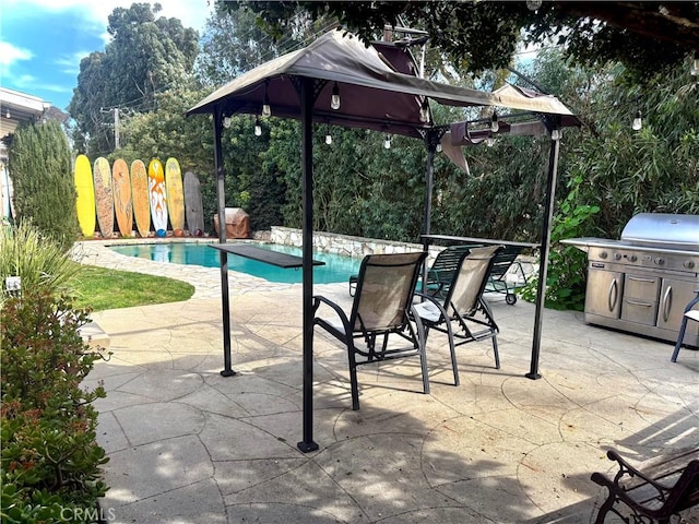 outdoor pool with a patio area