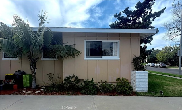 view of property exterior featuring board and batten siding