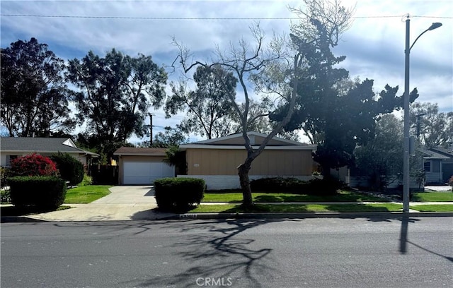 view of front of home featuring an attached garage and driveway