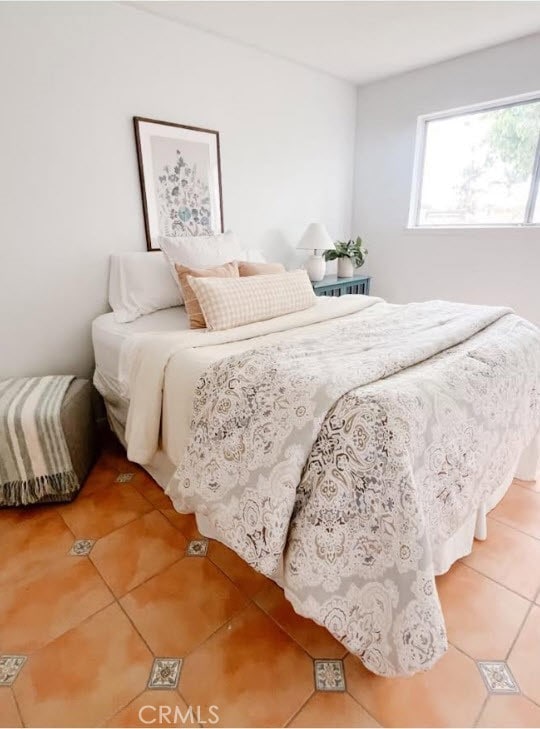 bedroom with tile patterned flooring