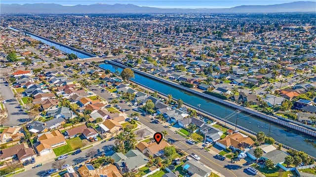 aerial view with a residential view and a water and mountain view