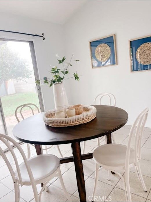 view of tiled dining space