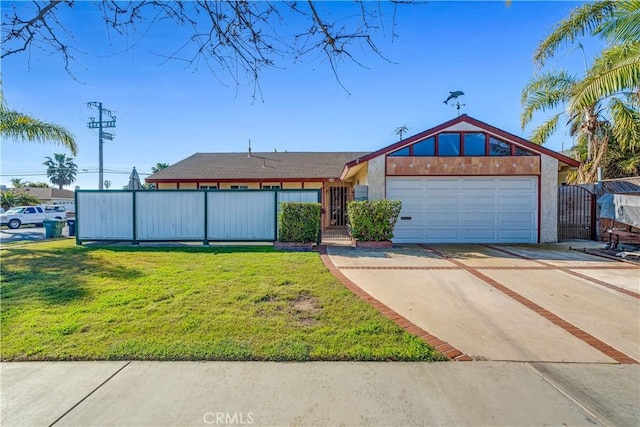 mid-century modern home with a front lawn, an attached garage, fence, and driveway