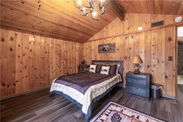 bedroom featuring wood ceiling, lofted ceiling with beams, an inviting chandelier, and wood finished floors