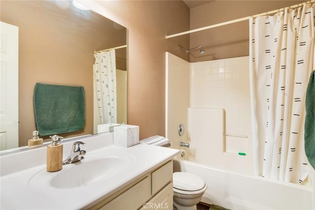 full bathroom with vanity, toilet, and shower / bath combo with shower curtain