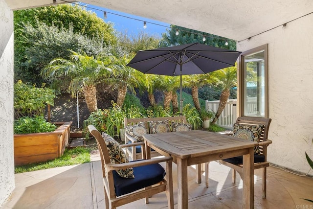 view of patio with outdoor dining area