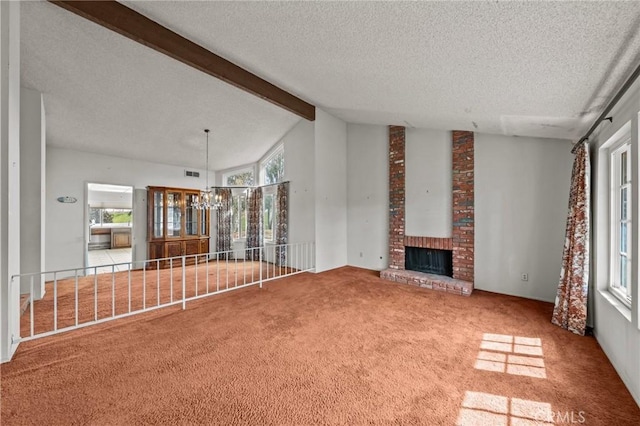 unfurnished living room featuring visible vents, a brick fireplace, beamed ceiling, carpet floors, and a textured ceiling