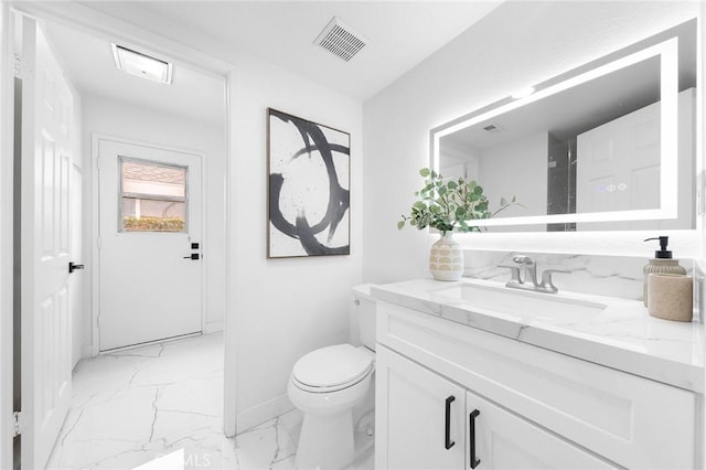 bathroom featuring visible vents, baseboards, toilet, marble finish floor, and vanity