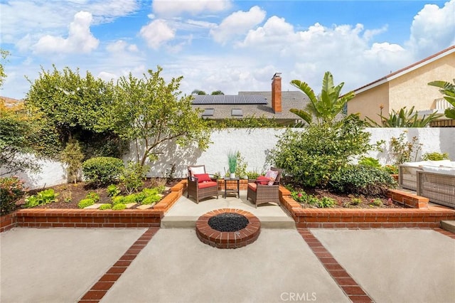 view of patio featuring outdoor lounge area and a fenced backyard