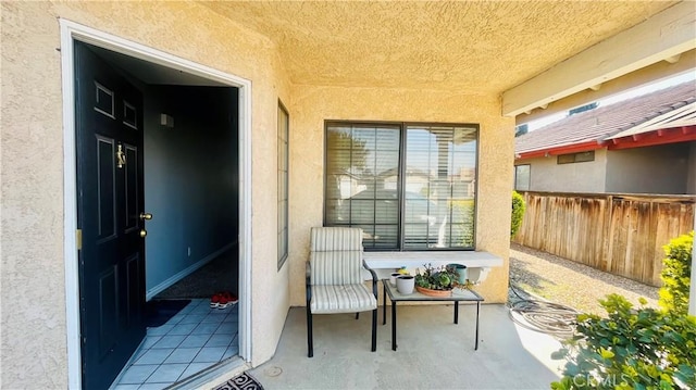 view of patio with fence