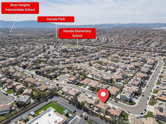 drone / aerial view with a mountain view and a residential view