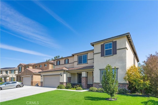 view of front of property with stucco siding, driveway, a garage, and a front lawn