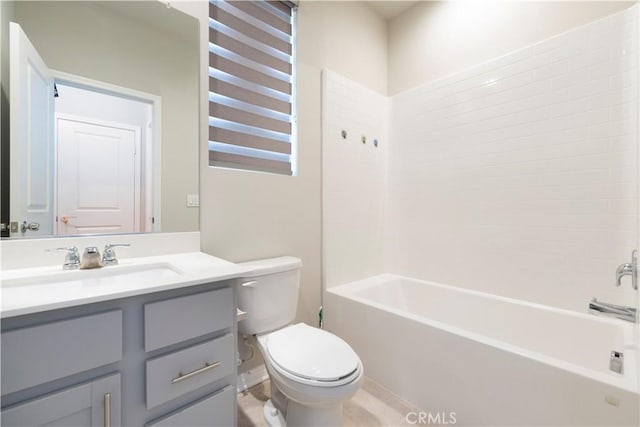 bathroom with vanity, toilet, and shower / washtub combination