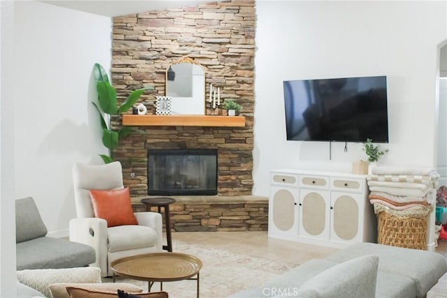 living room featuring tile patterned floors and a fireplace