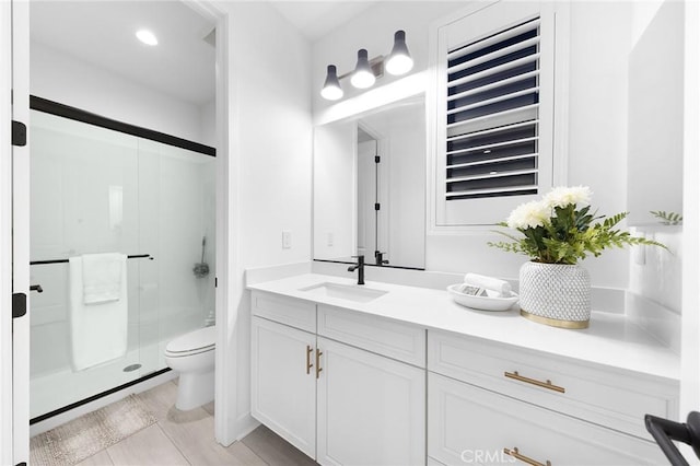 450 Chorus, Irvine, CA 92618 - bathroom featuring toilet, a stall shower, and vanity