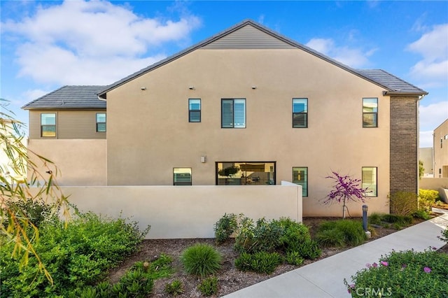 450 Chorus, Irvine, CA 92618 - view of home's exterior with stucco siding