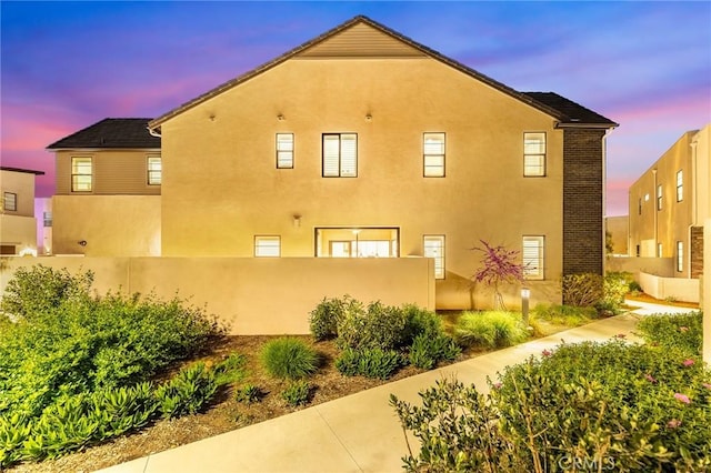 450 Chorus, Irvine, CA 92618 - view of side of property with stucco siding
