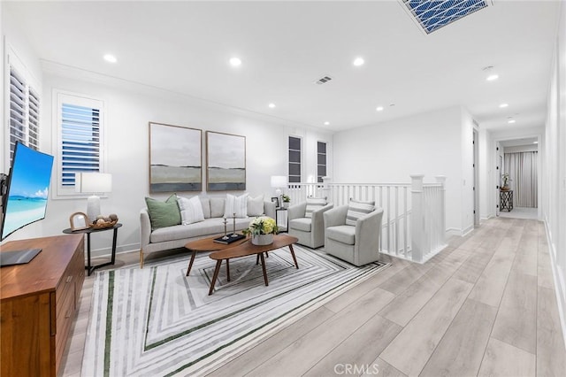 450 Chorus, Irvine, CA 92618 - living room featuring recessed lighting, light wood-style floors, visible vents, and baseboards