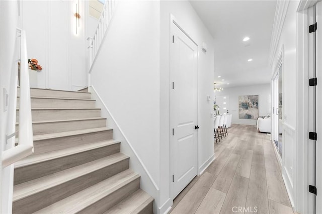 450 Chorus, Irvine, CA 92618 - stairs featuring recessed lighting and wood finished floors