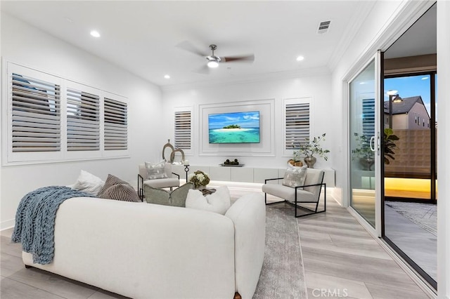 450 Chorus, Irvine, CA 92618 - living area featuring visible vents, ornamental molding, recessed lighting, light wood-style floors, and ceiling fan