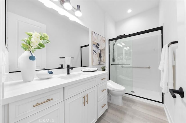 450 Chorus, Irvine, CA 92618 - bathroom with recessed lighting, toilet, a stall shower, and vanity