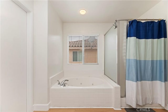 29193 Via Espada, Murrieta, CA 92563 - full bathroom with a jetted tub, curtained shower, and wood finished floors