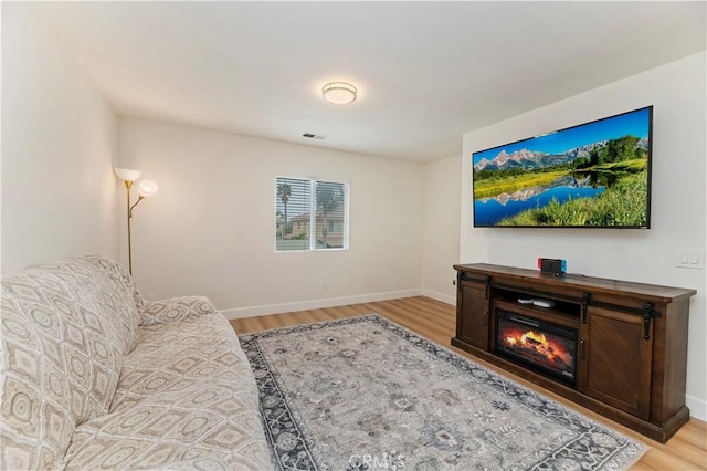 29193 Via Espada, Murrieta, CA 92563 - living room with light wood-style flooring and baseboards