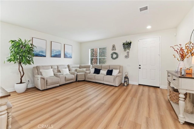 29193 Via Espada, Murrieta, CA 92563 - living area featuring light wood-style floors, recessed lighting, and baseboards
