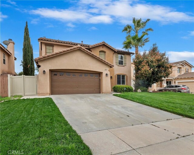 29193 Via Espada, Murrieta, CA 92563 - mediterranean / spanish house featuring stucco siding, driveway, an attached garage, and a tile roof