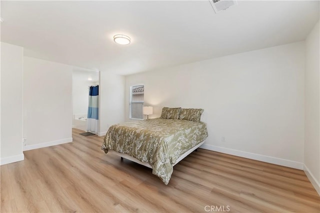 29193 Via Espada, Murrieta, CA 92563 - bedroom with light wood finished floors and baseboards