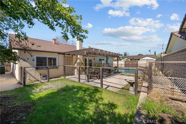 view of yard featuring a patio and a fenced backyard