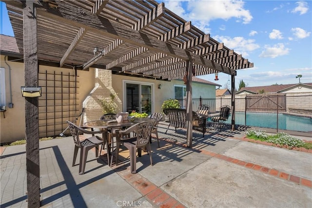 view of patio with outdoor dining space, a fenced in pool, a pergola, and fence