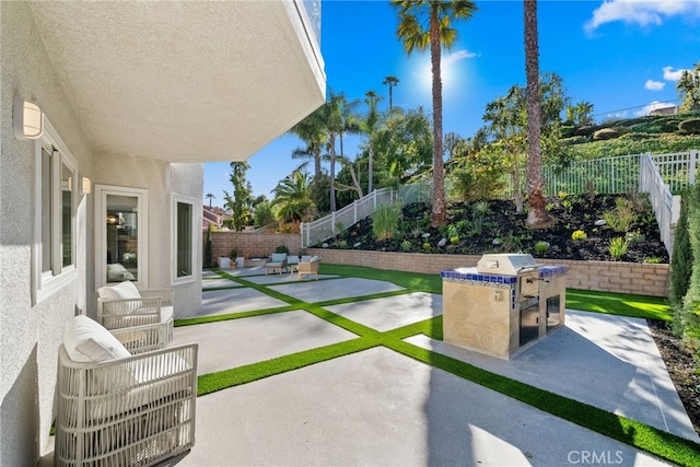 view of patio featuring a fenced backyard