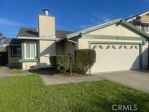 ranch-style house featuring stucco siding, an attached garage, a chimney, and driveway