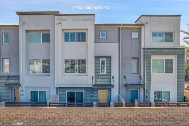 exterior space featuring stucco siding