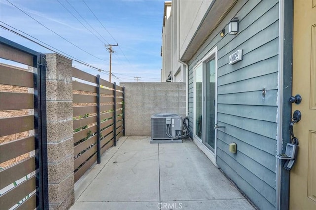 balcony featuring cooling unit and a patio area