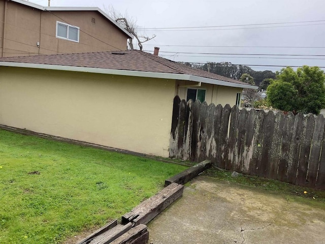 view of yard with a patio and fence