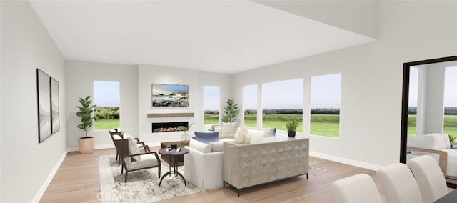 9547 N Andora Ave, Chatsworth, CA 91311 - living room with baseboards, a fireplace, light wood-type flooring, and a healthy amount of sunlight