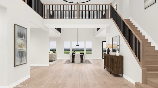9547 N Andora Ave, Chatsworth, CA 91311 - foyer with baseboards, wood finished floors, and a towering ceiling
