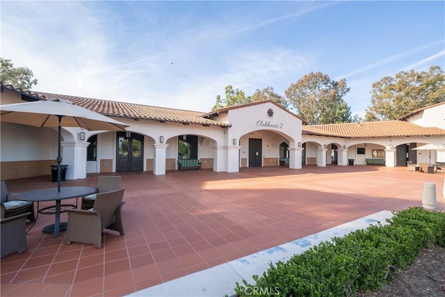 exterior space featuring french doors and outdoor dining area