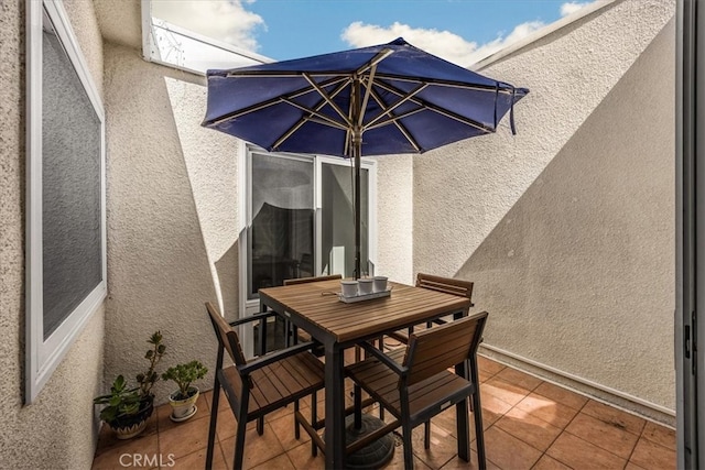 view of patio with outdoor dining area