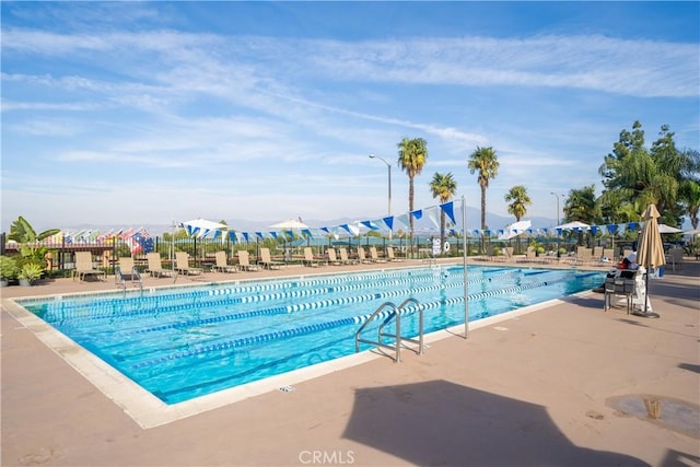 pool with a patio area