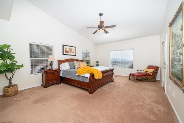 bedroom featuring ceiling fan, high vaulted ceiling, baseboards, and light carpet