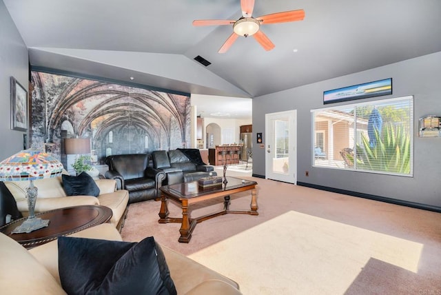 living room featuring visible vents, arched walkways, carpet floors, ceiling fan, and vaulted ceiling