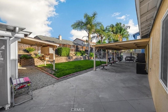 view of patio featuring fence